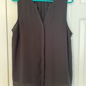 Black sleeveless button down top